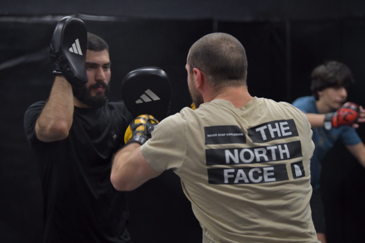 Pad work session during an MMA training camp in Georgia